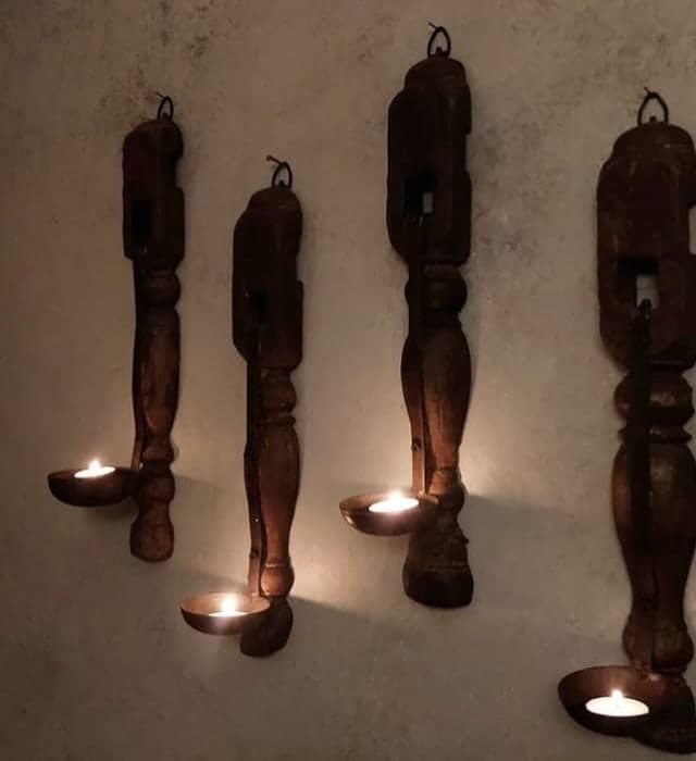Charpai Leg Diya Sconce — Reclaimed charpai legs, iron